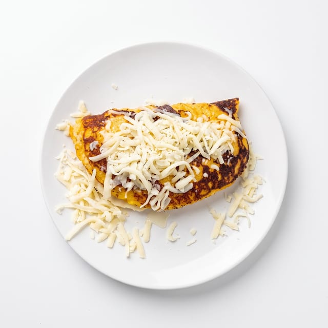 Cachapa con Queso / Sweet Corn Pancake with Cheese.